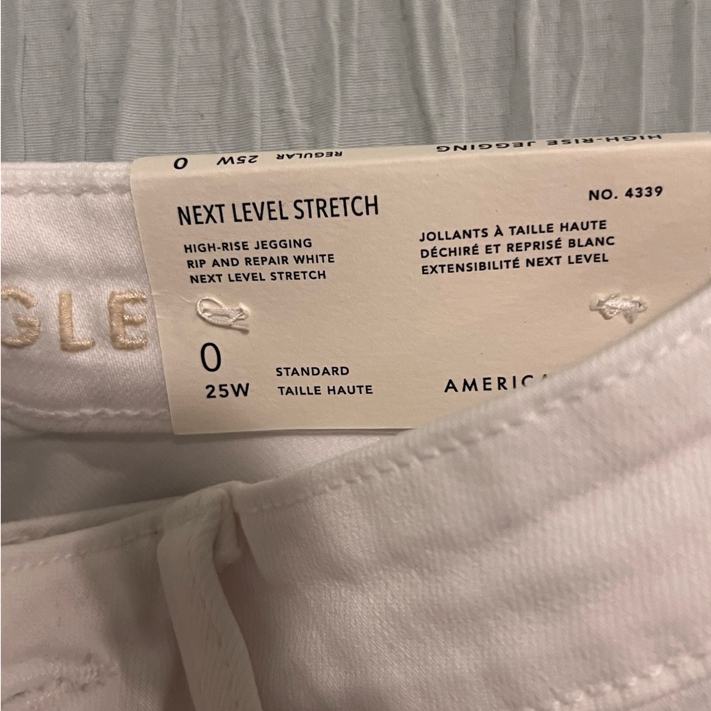 NWT - American Eagle Next Level Stretch White Jeans Size -0